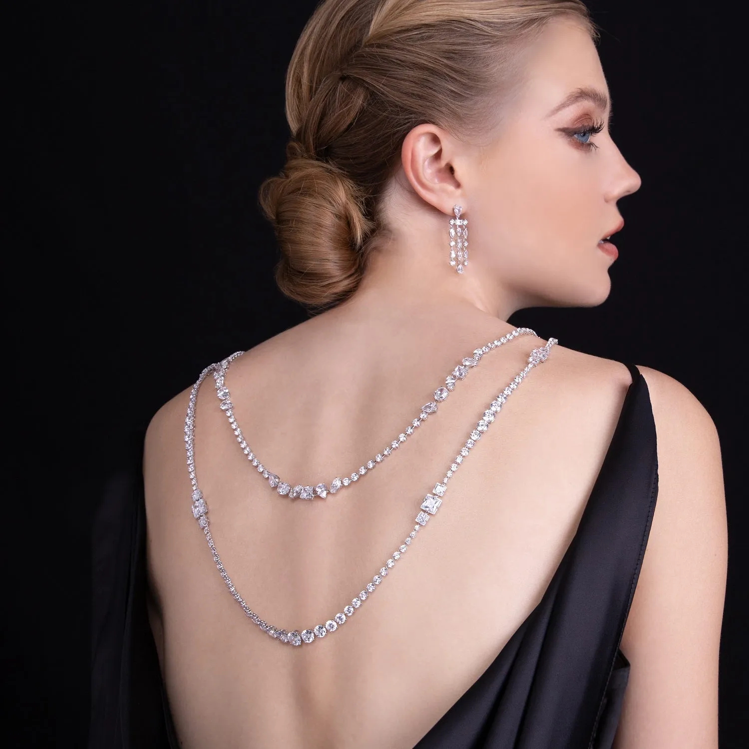 Laureate: Silver rhodium plated multi-shaped marquise and pear CZ, 32 1/8" long necklace